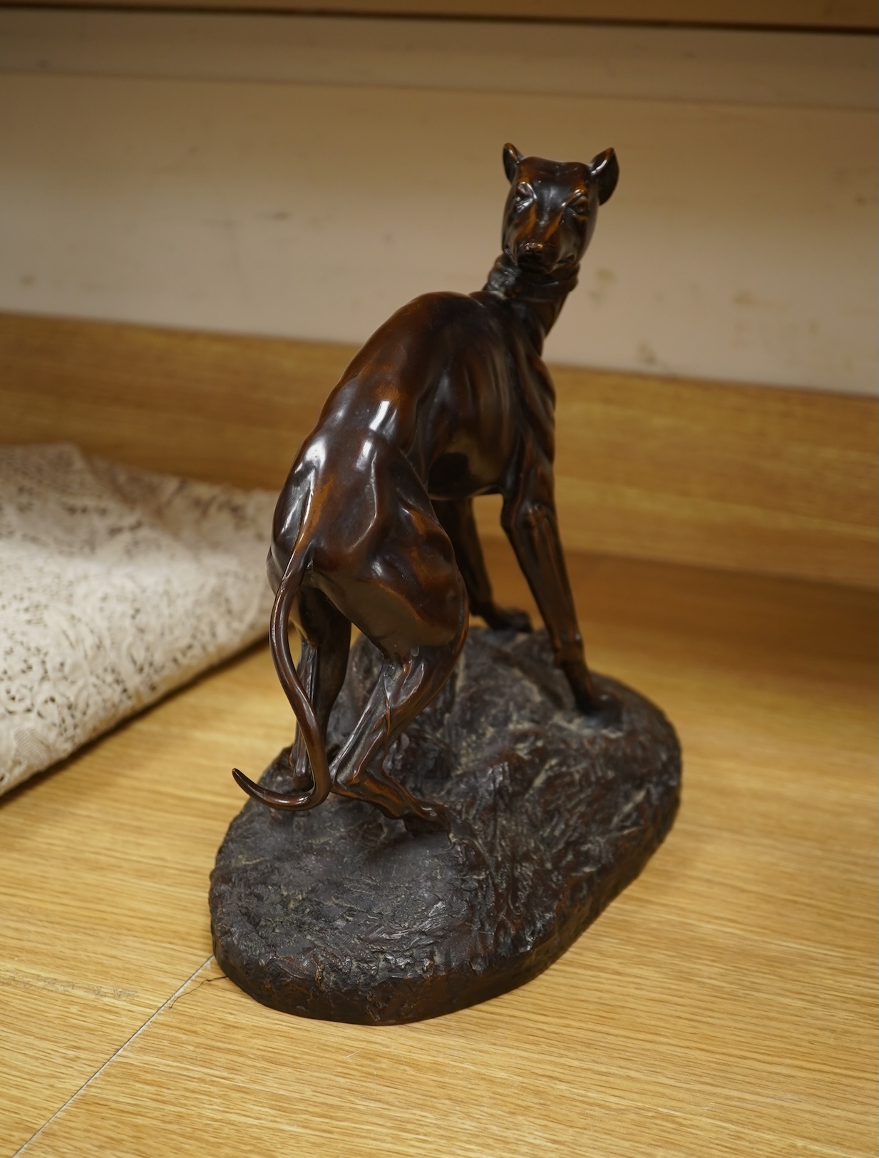 After Theodore Gechter, a model of bronze greyhound, 32cm wide x 29.5cm high